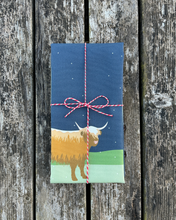 Load image into Gallery viewer, Winter Highland Cow Christmas Tea Towel
